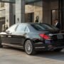 lucid origin_A_realistic_photograph_of_a_polished_black_luxury_executive_sedan_parked_outside 0 90x90