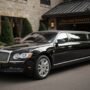 lucid origin_A_realistic_photograph_of_an_elegant_black_stretch_limousine_parked_outside_a_so 0 90x90